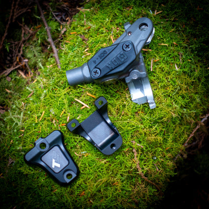 Master Cylinder Saver clamped around a broken Braktec master cylinder clamp